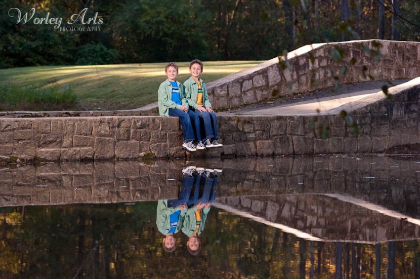 boys on bridge reflection